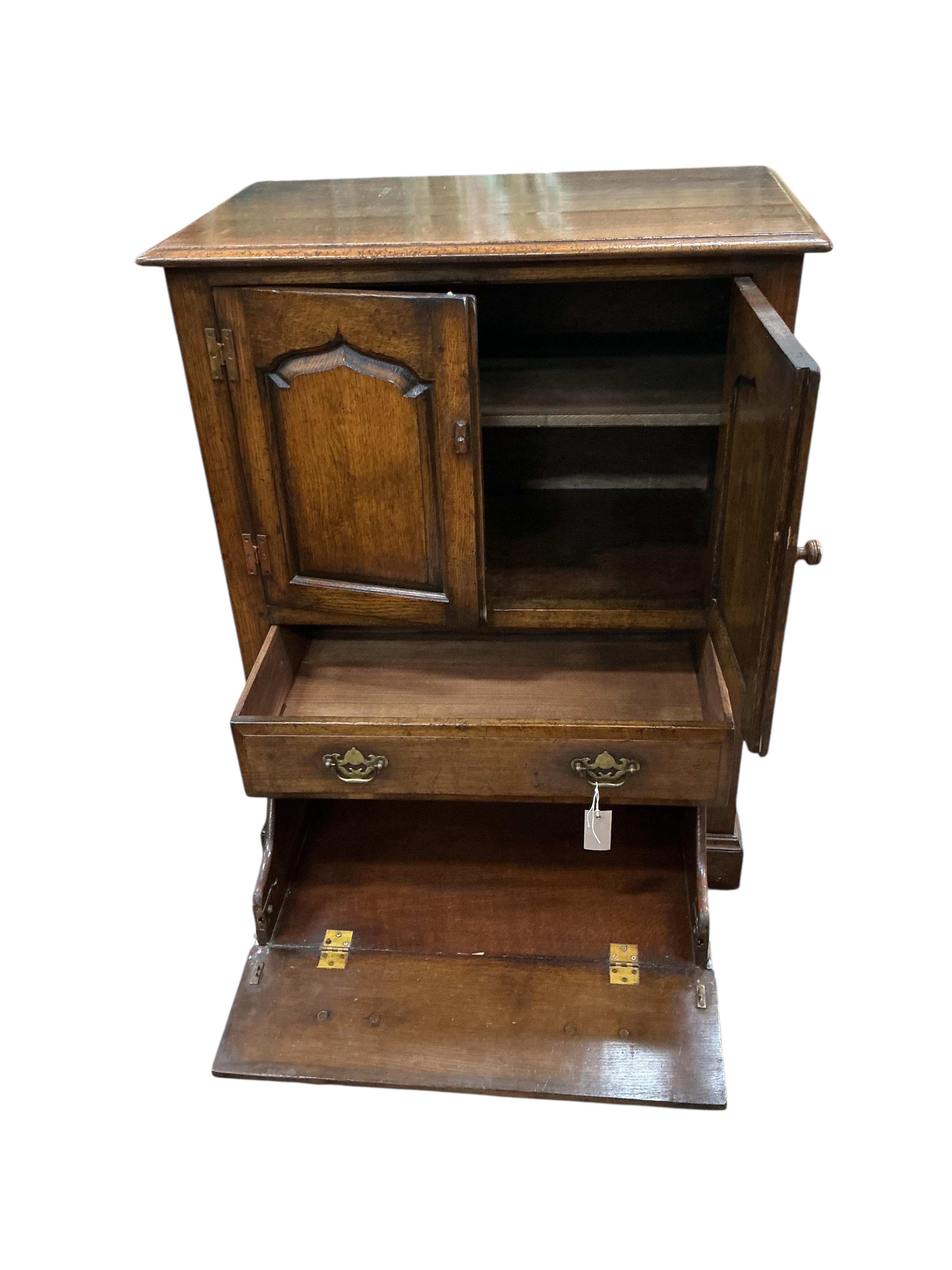 A reproduction 18th century style oak two drawer side cabinet, width 81cm, depth 48cm, height 103cm